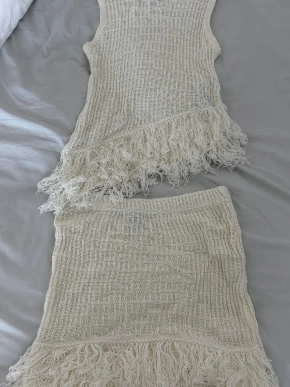 Light Cream Sleeveless Knit Top Mini Skirt Set with Fringe Detail